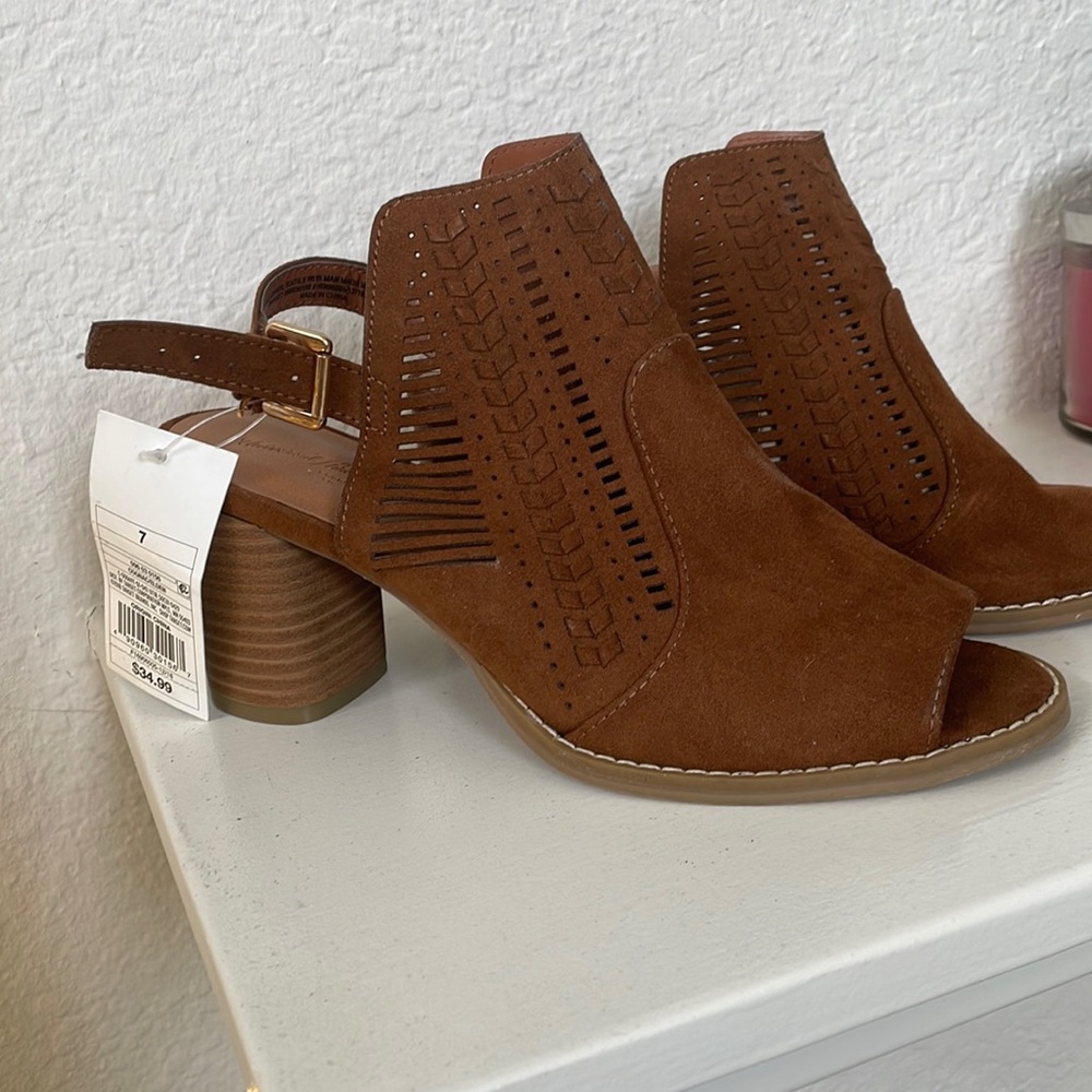 Brown suede color, size 7, with 3 inch heel